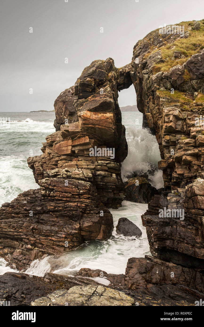 A small sea arch near Clashnessie Bay, Assynt, Scotland, UK. Stock Photo