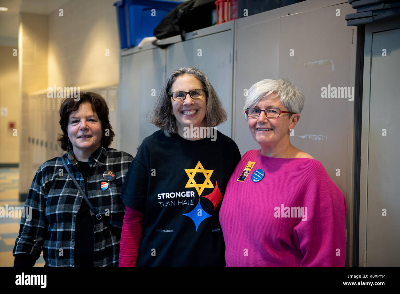 A poll worker is seen wearing a t shirt written on 'Stronger than Hate.'during the midterm elections in Pittsburgh, PA in the aftermath of the Tree of Life shootings. Stock Photo