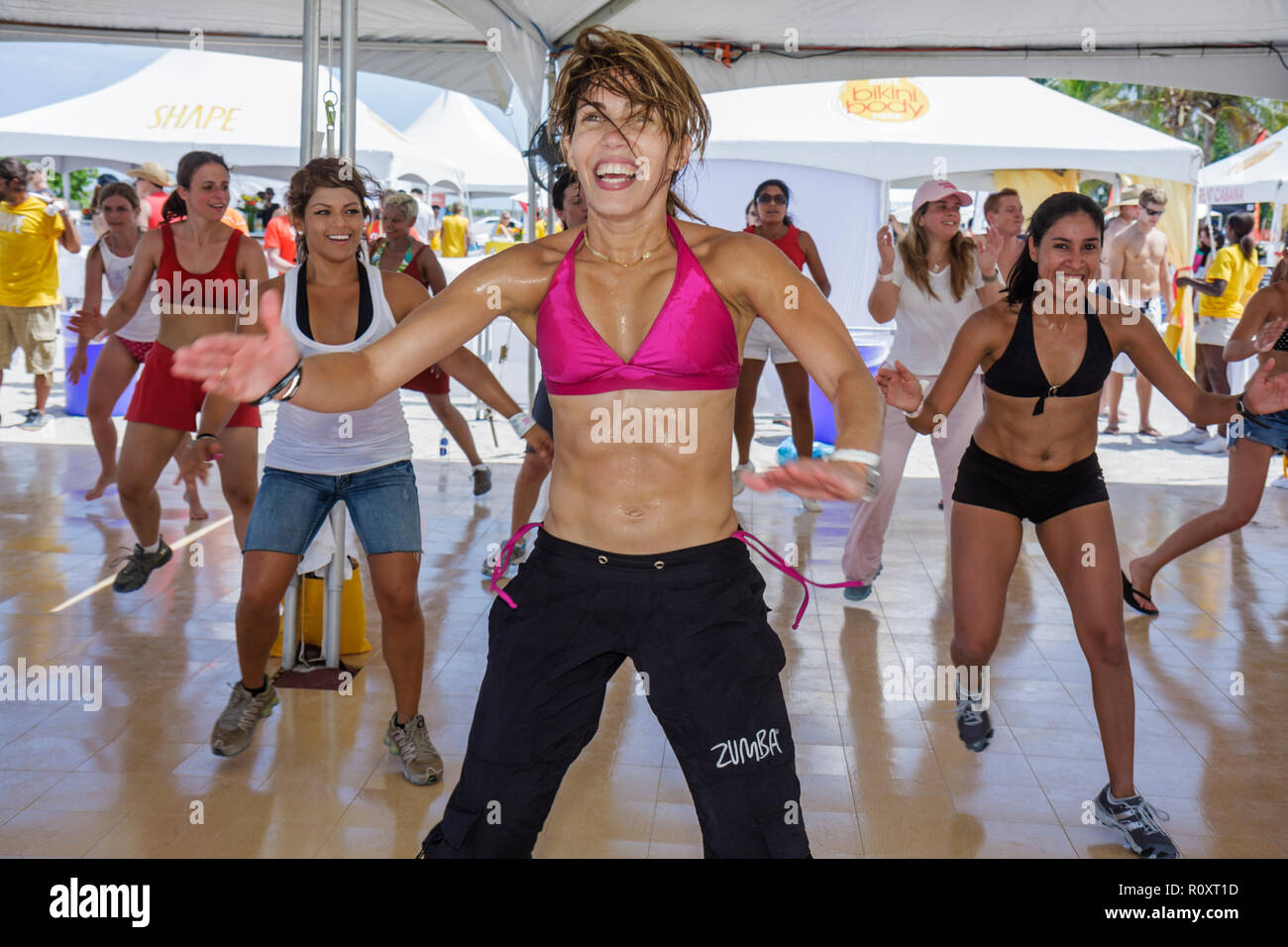 Miami Beach Florida,Lummus Park,Shape Bikini Body Tour,fitness class,exercise,Latin Fusion,Zumba,Hispanic woman female women,cardio,workout,sweat,abs, Stock Photo