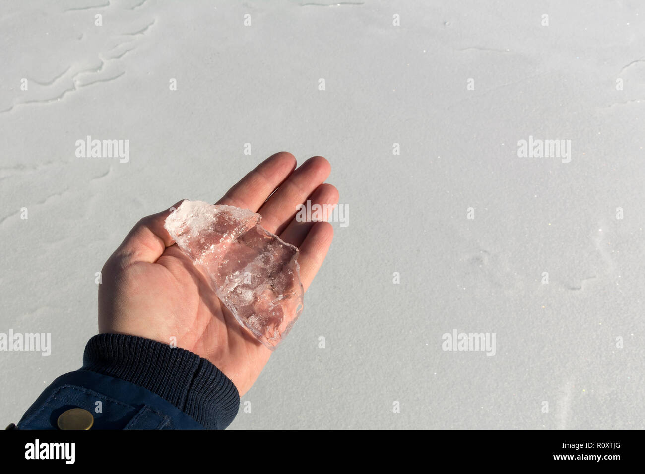 Use Your Hands To Lift Large Ice Cubes. Stock Photo, Picture and