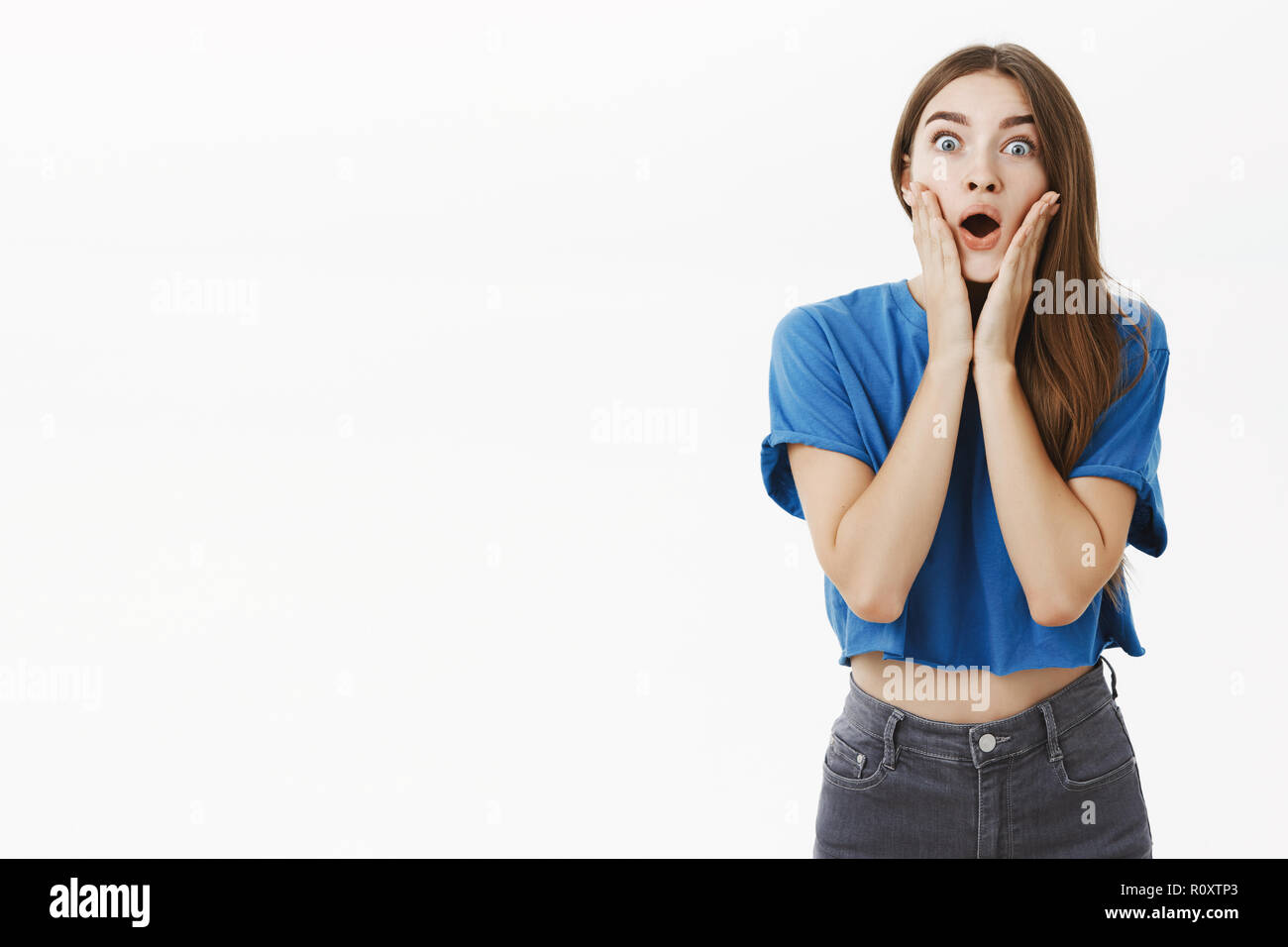 Portrait of impressed and astonished gossip girl with brown hair in ...