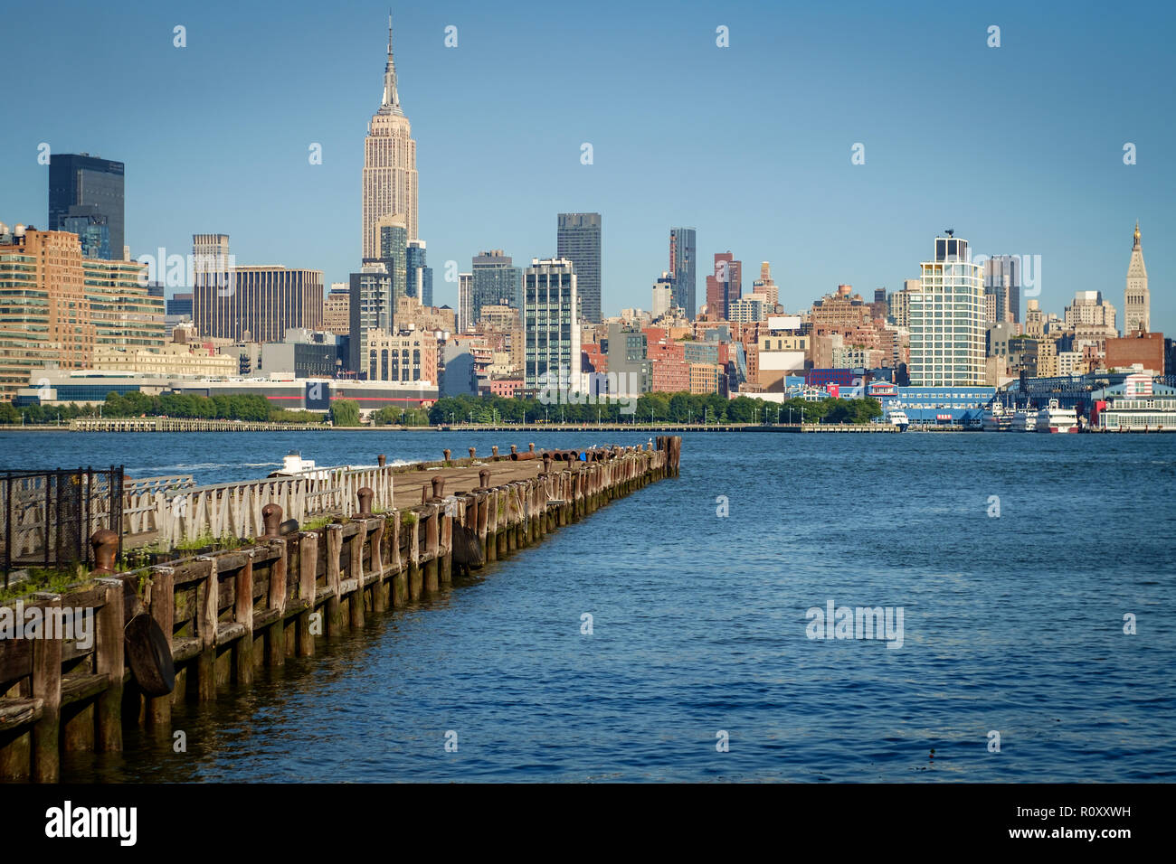 Beautiful New York City skyline against summer blue sky Stock Photo - Alamy