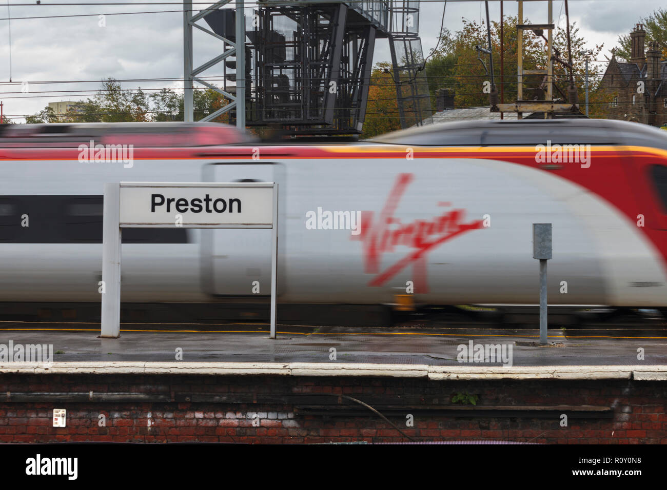 Virgin Trains Pendolino train arriving at Preston railway station. Stock Photo