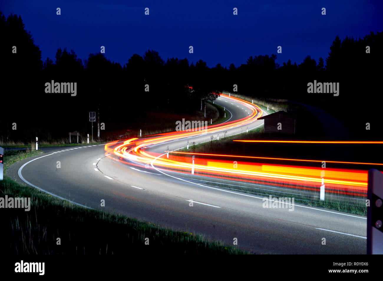 Long exposure shot of traffic lights in the black forest Stock Photo