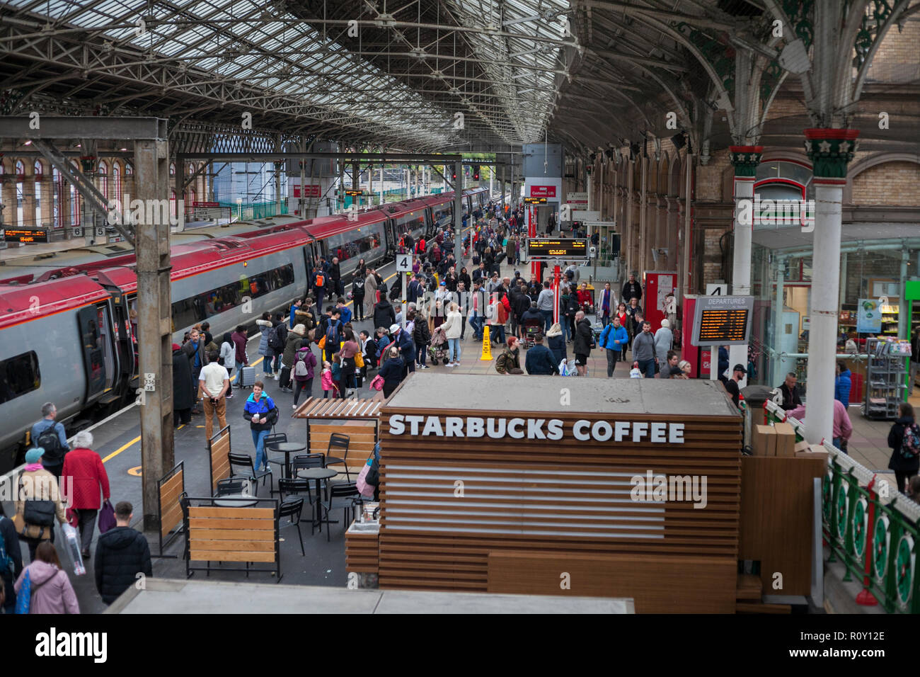 rail passengers leaving a virgin trains pendolino at preston railway station on the west coast main line stock photo alamy