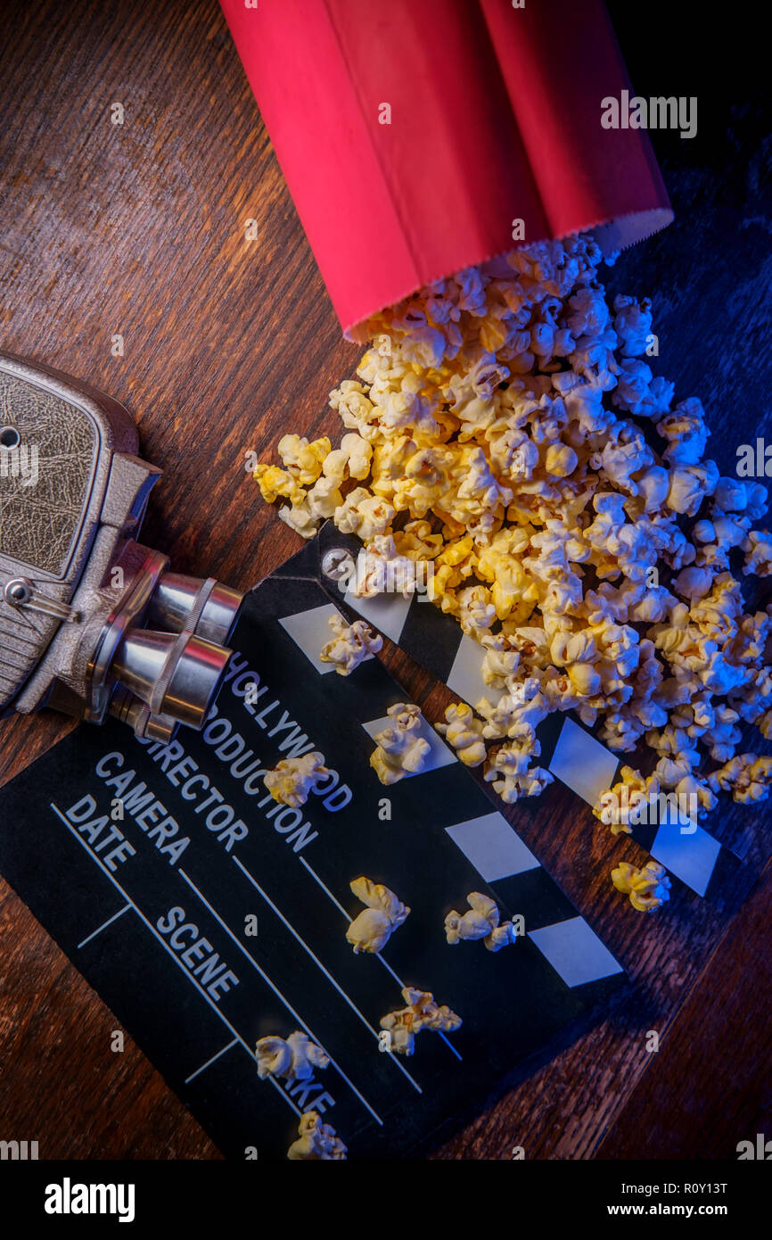 Movie theater popcorn with butter and blue backlighting Stock Photo