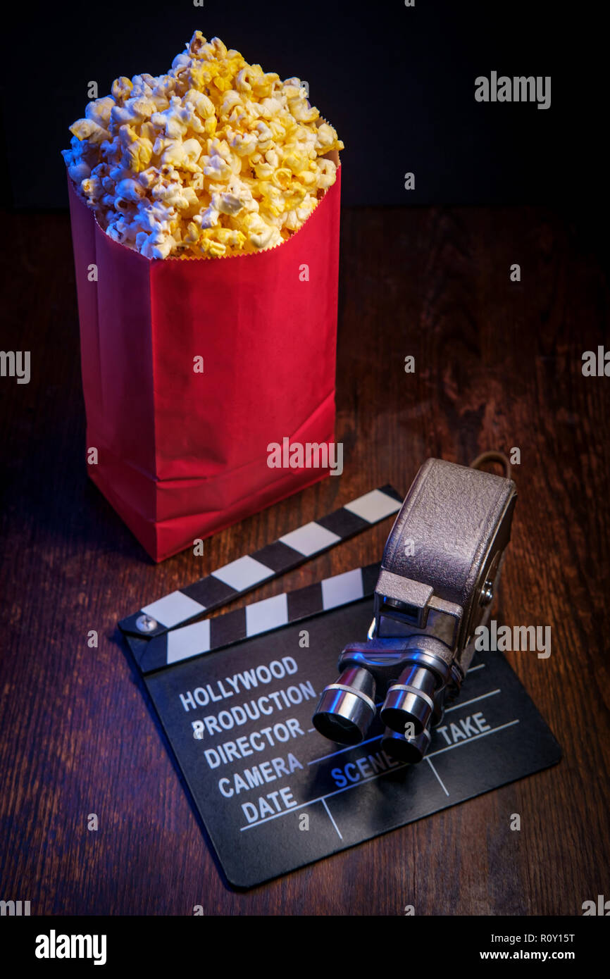 Movie theater popcorn with butter and blue backlighting Stock Photo