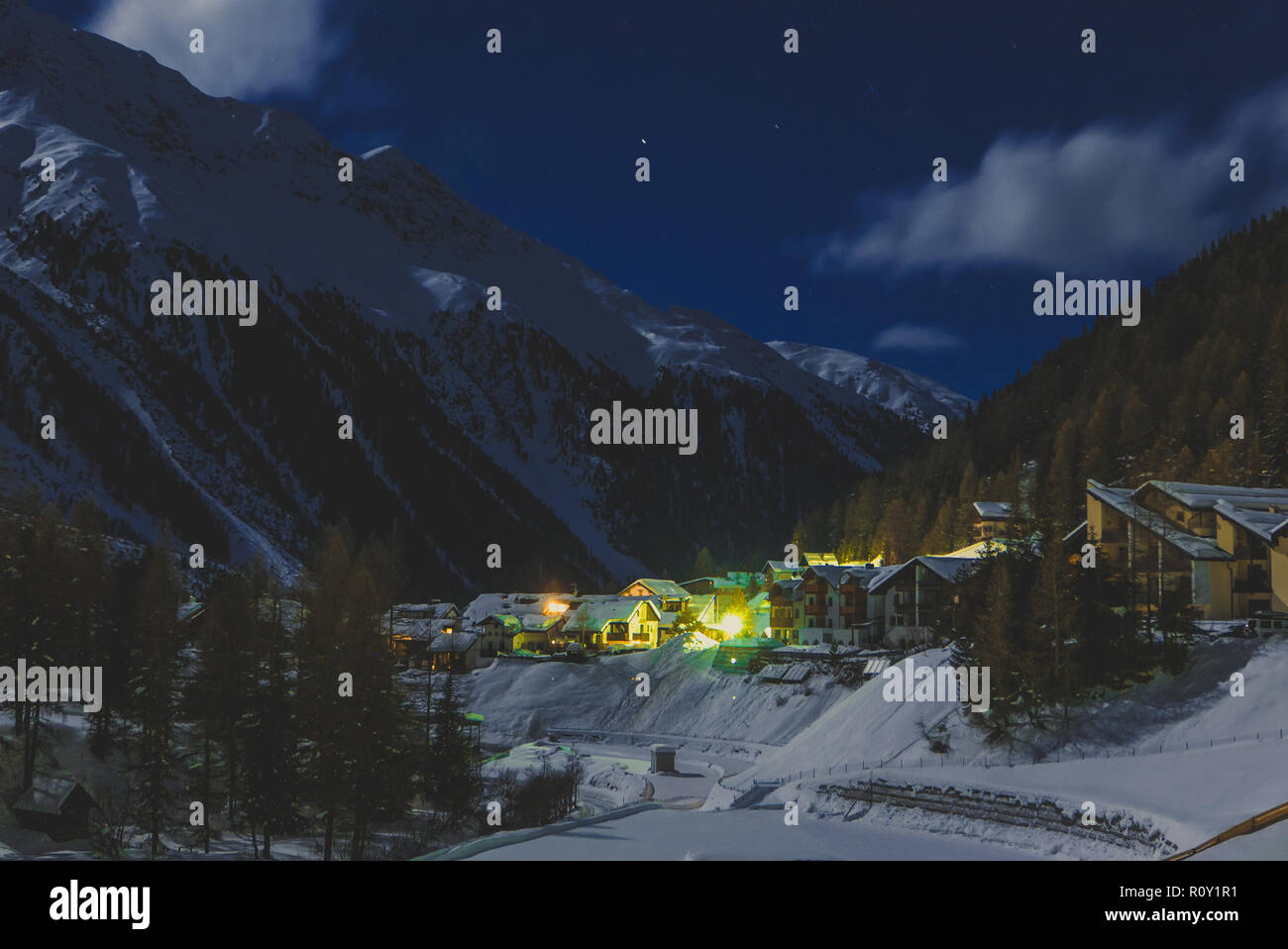 Winter cottage at night in popular ski resort Solda, Italy Stock Photo