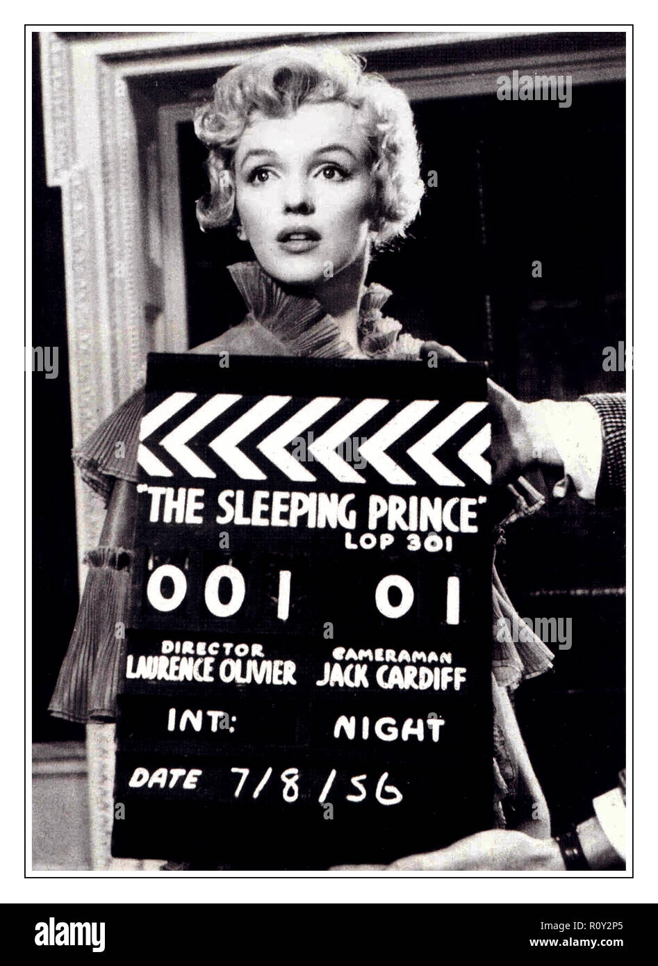 1950's Marilyn Monroe on the set of 'The Sleeping Prince' ( The Prince and The Showgirl) in a screen test with on-set clapper board showing Director Lawrence Olivier & Cameraman Jack Cardiff  7/8/1956 Stock Photo
