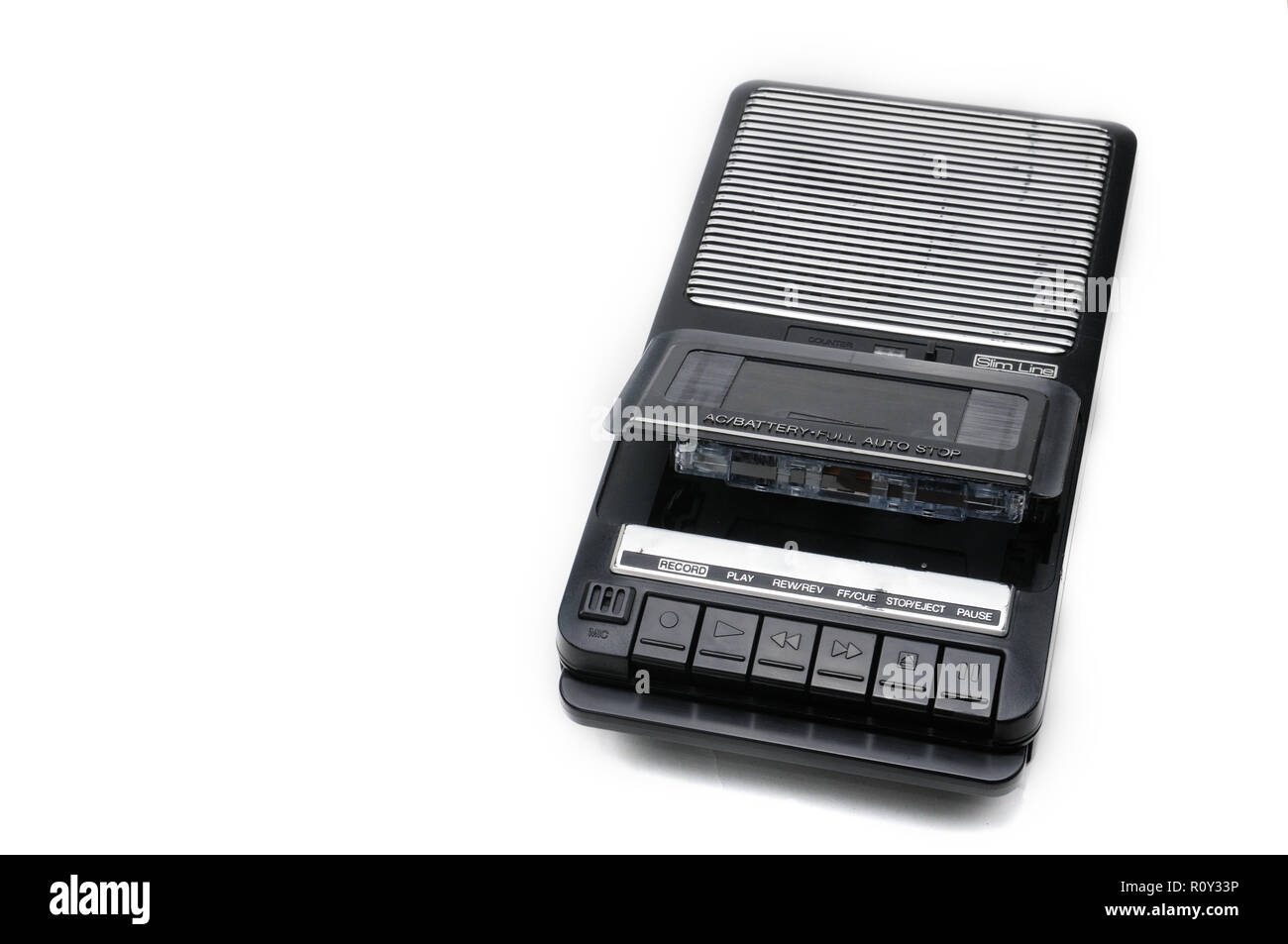 Cassette tape recorder for recording and playing audio cassettes on an white isolated background