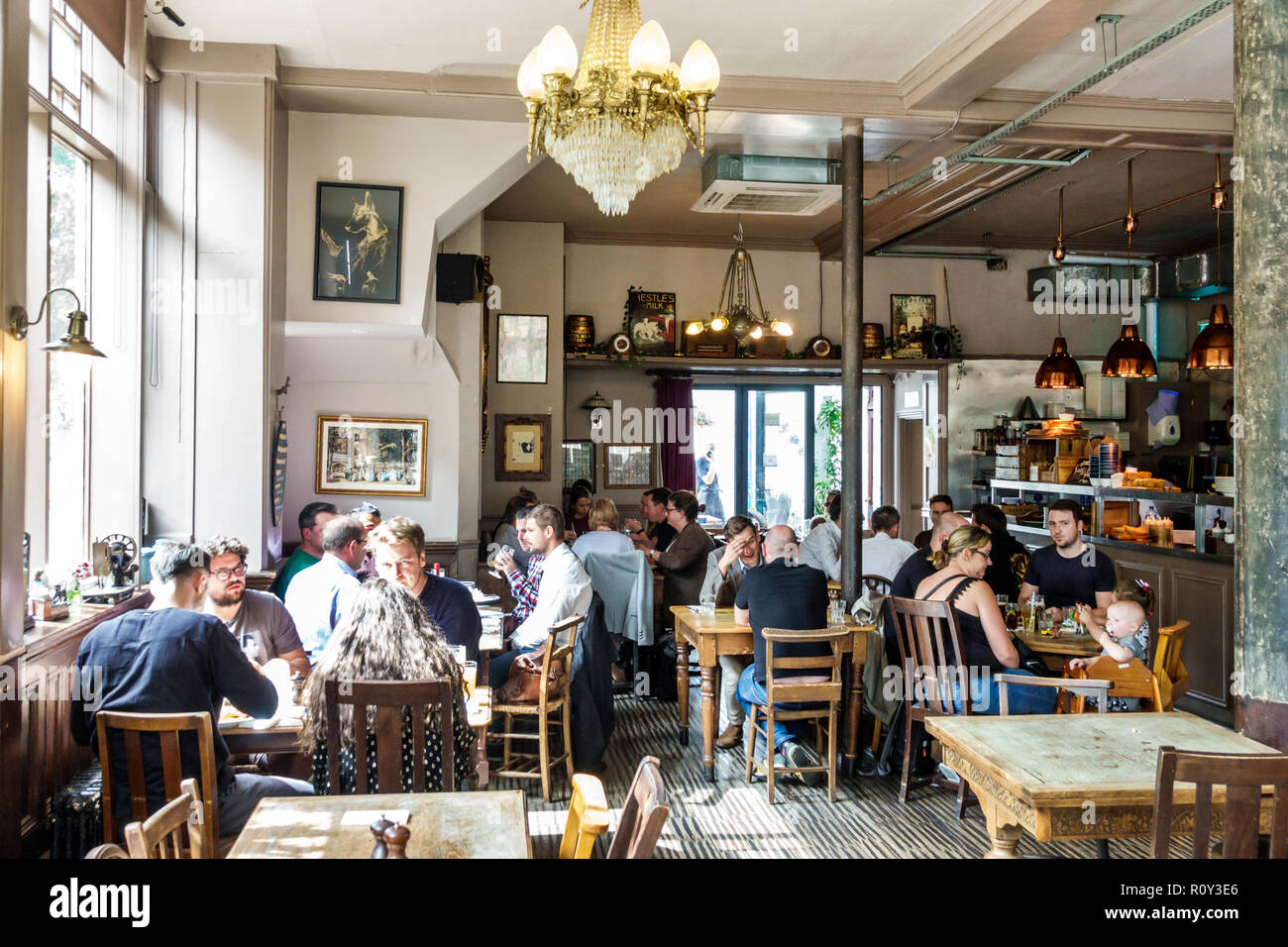 London England,UK,Lambeth Vauxhall,The Black Dog Pub,traditional public house,restaurant restaurants food dining cafe cafes,tables,dining,drinking,man Stock Photo