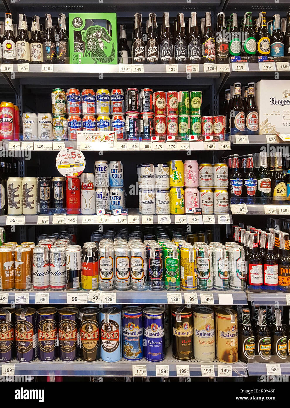 BANGKOK THAILAND OCTOBER 27 Beer rack many brands on supermarket stand. Various bottles and