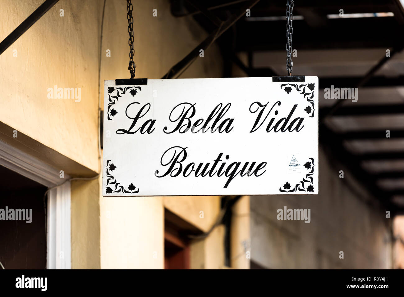 New Orleans, USA - April 22, 2018: Downtown old Decatur street in Louisiana famous town, city, shopping boutique sign for La Bella Vida, nobody Stock Photo