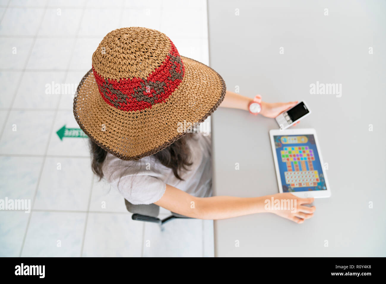student working with tablet in library Stock Photo