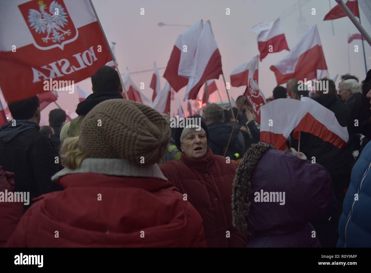 November 11, 2017 - Warsaw, mazowieckie, Poland - Nationalists seen waving flags on the Independence Day during the demonstration.Last year about 60,000 people took part in the nationalist march marking Poland's Independence Day, according to police figures. The march has taken place each year on November 11th for almost a decade, and has grown to draw tens of thousands of participants, including extremists from across the EU.Warsaw's mayor Hanna Gronkiewicz-Waltz has banned the event. Organizers said they would appeal against the decision, insisting they would go ahead with the march an Stock Photo