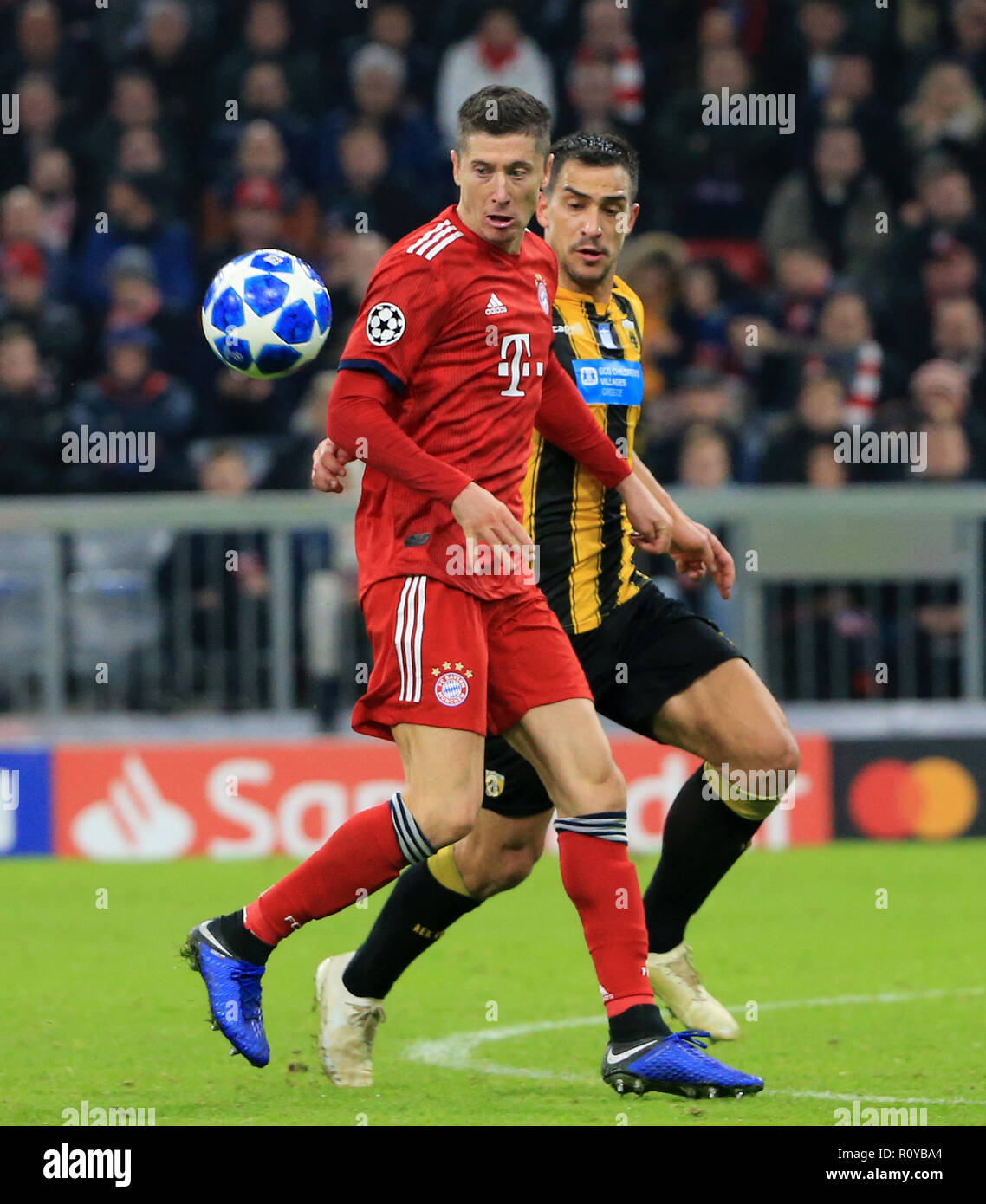 Munich, Germany. 7th Nov, 2018. Bayern Munich's Leon Goretzka (L) vies with  AEK Athen's Rodrigo Galo during a 4th round match of group E in the UEFA  Champions League between Bayern Munich