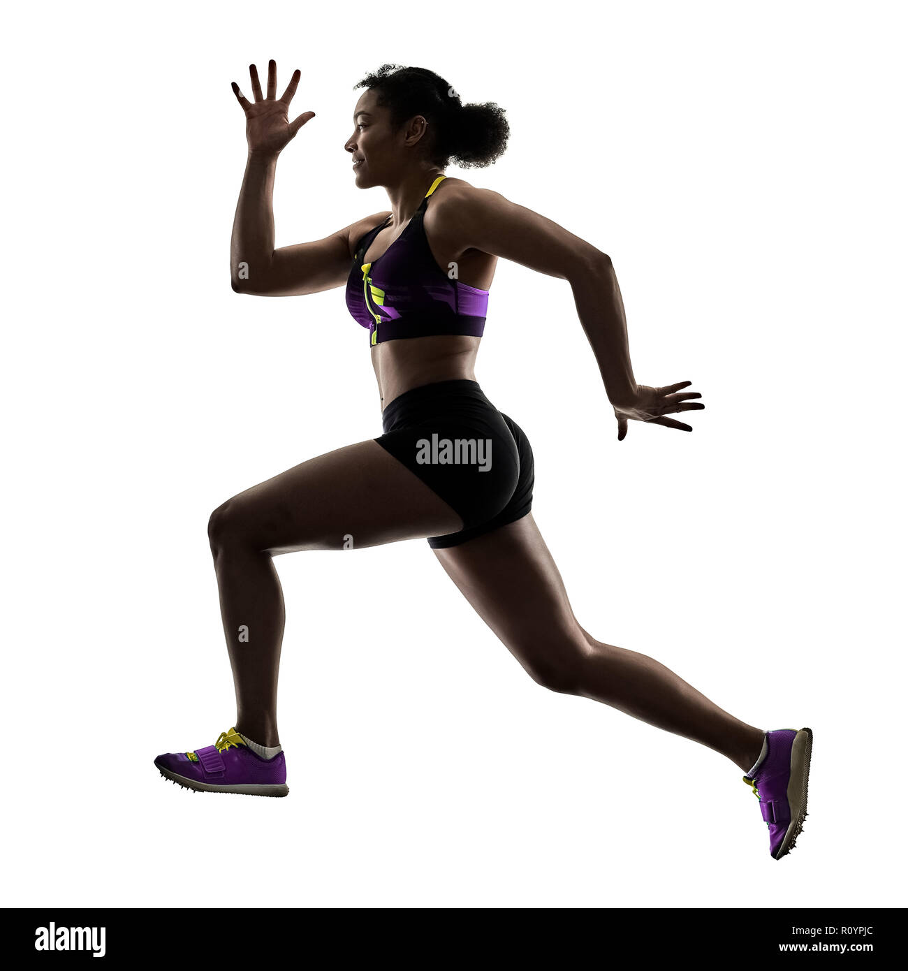 Strong Athletic Female Runner On Black Foto de stock 1071432878