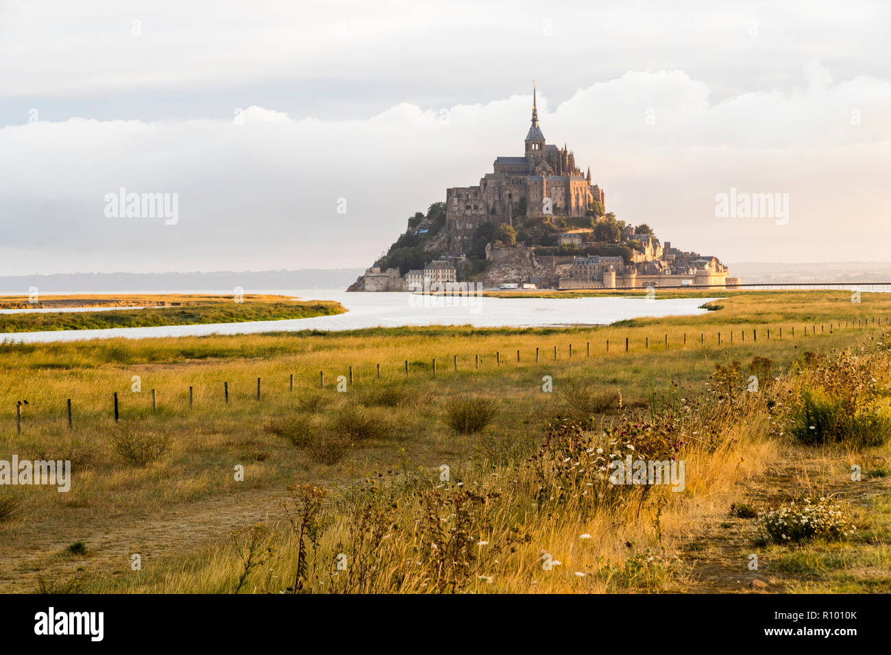 Le Mont-Saint-Michel, France, an island and monastery in Normandy, World Heritage Site since 1979, on a warm summer morning Stock Photo