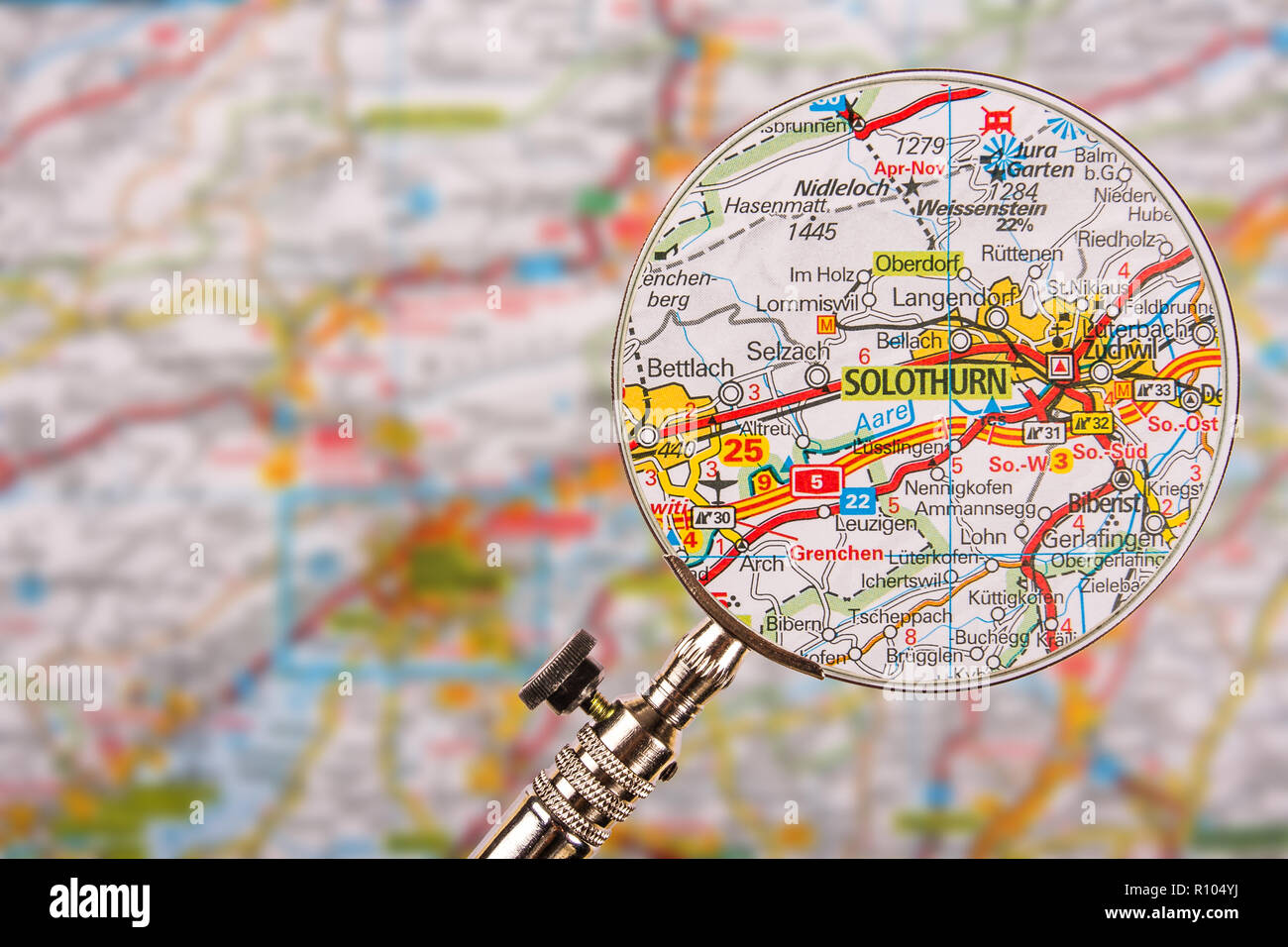 Map of Solothurn with magnifying glass on table Stock Photo
