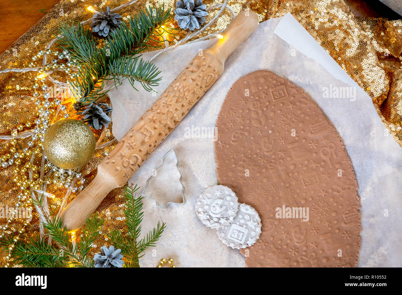 Rolling Pin With A Pattern On A Wooden Decorated Table Covered