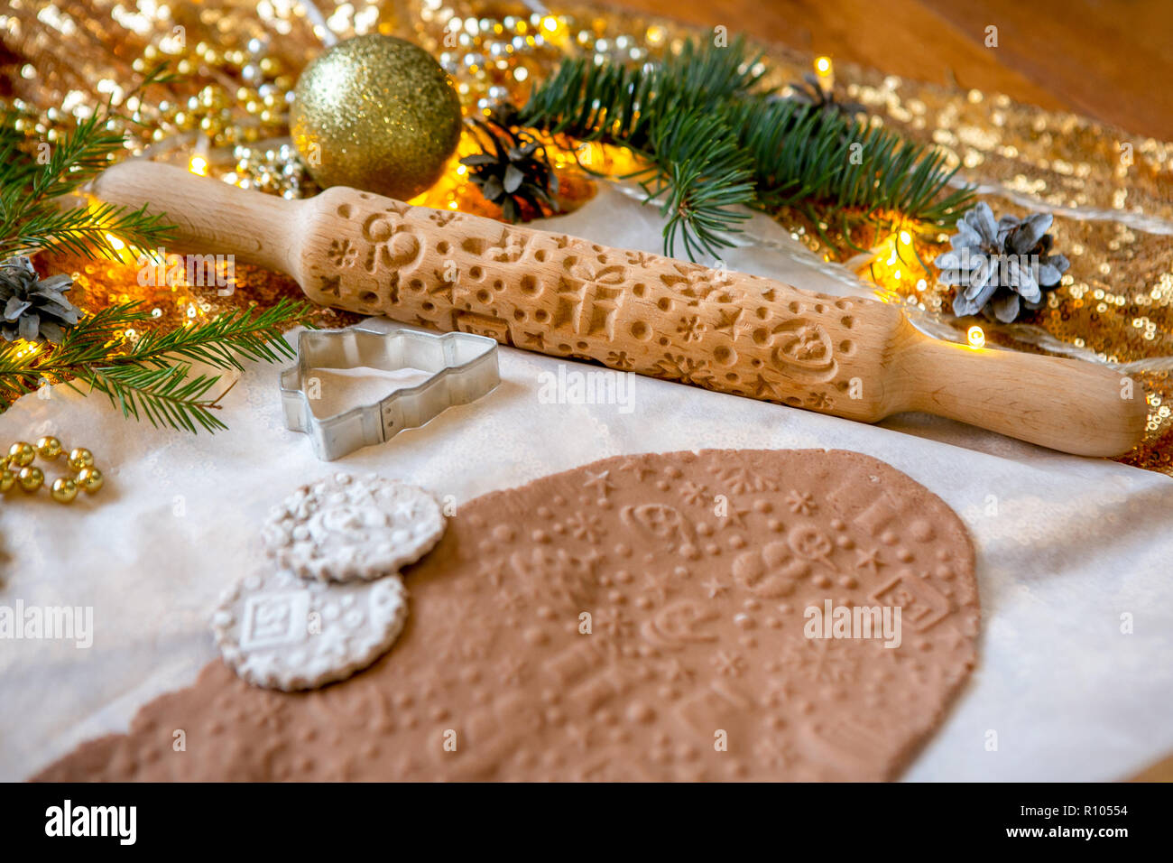 Rolling Pin With A Pattern On A Wooden Decorated Table Covered