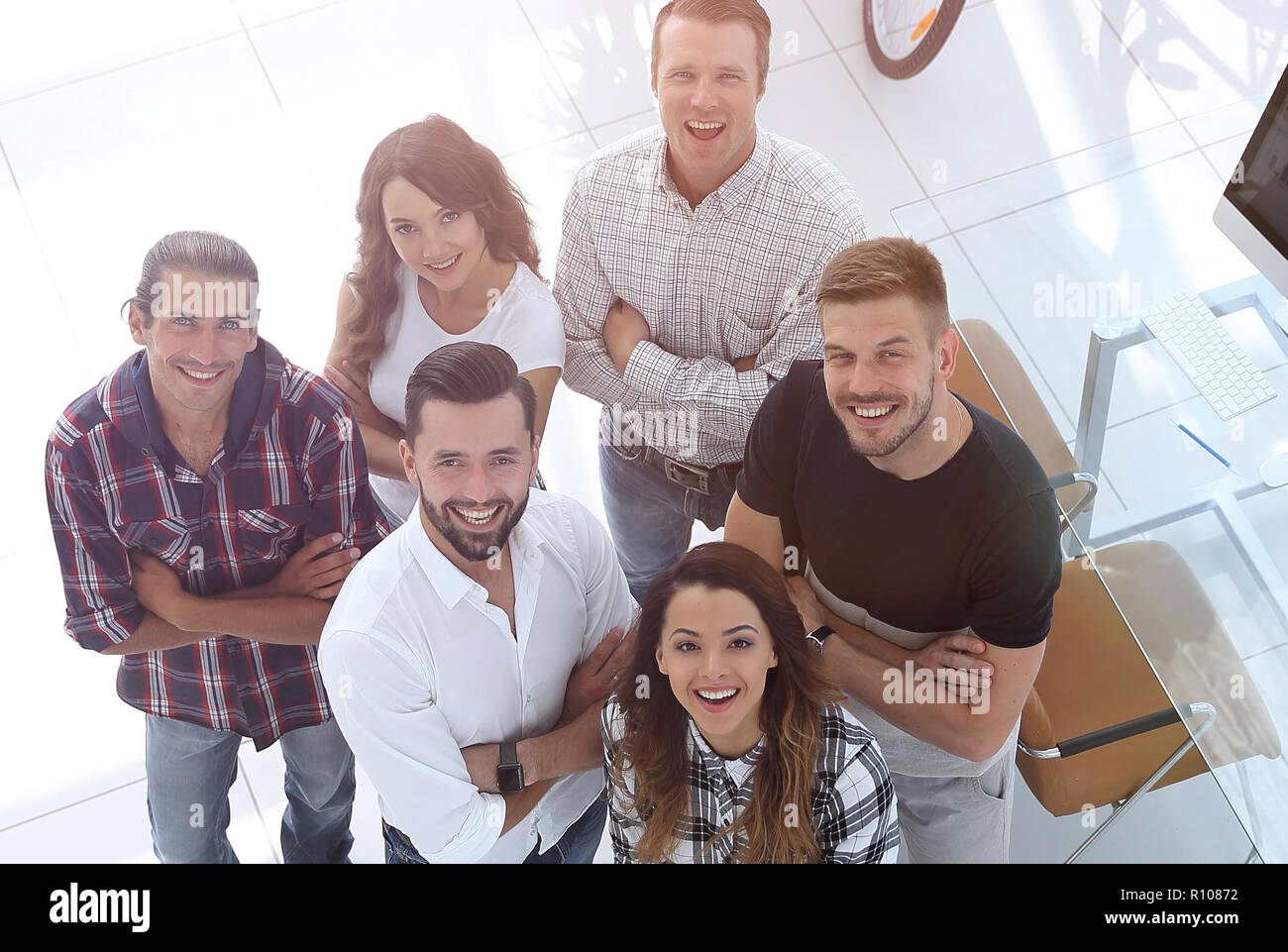 business team standing near the desktop Stock Photo - Alamy