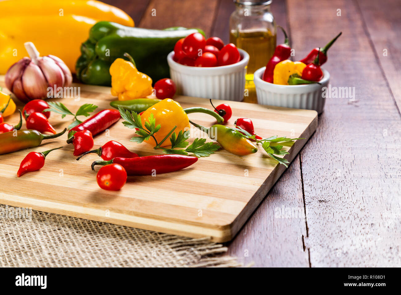 mix of peppers with tomato, garlic and olive oil. Stock Photo