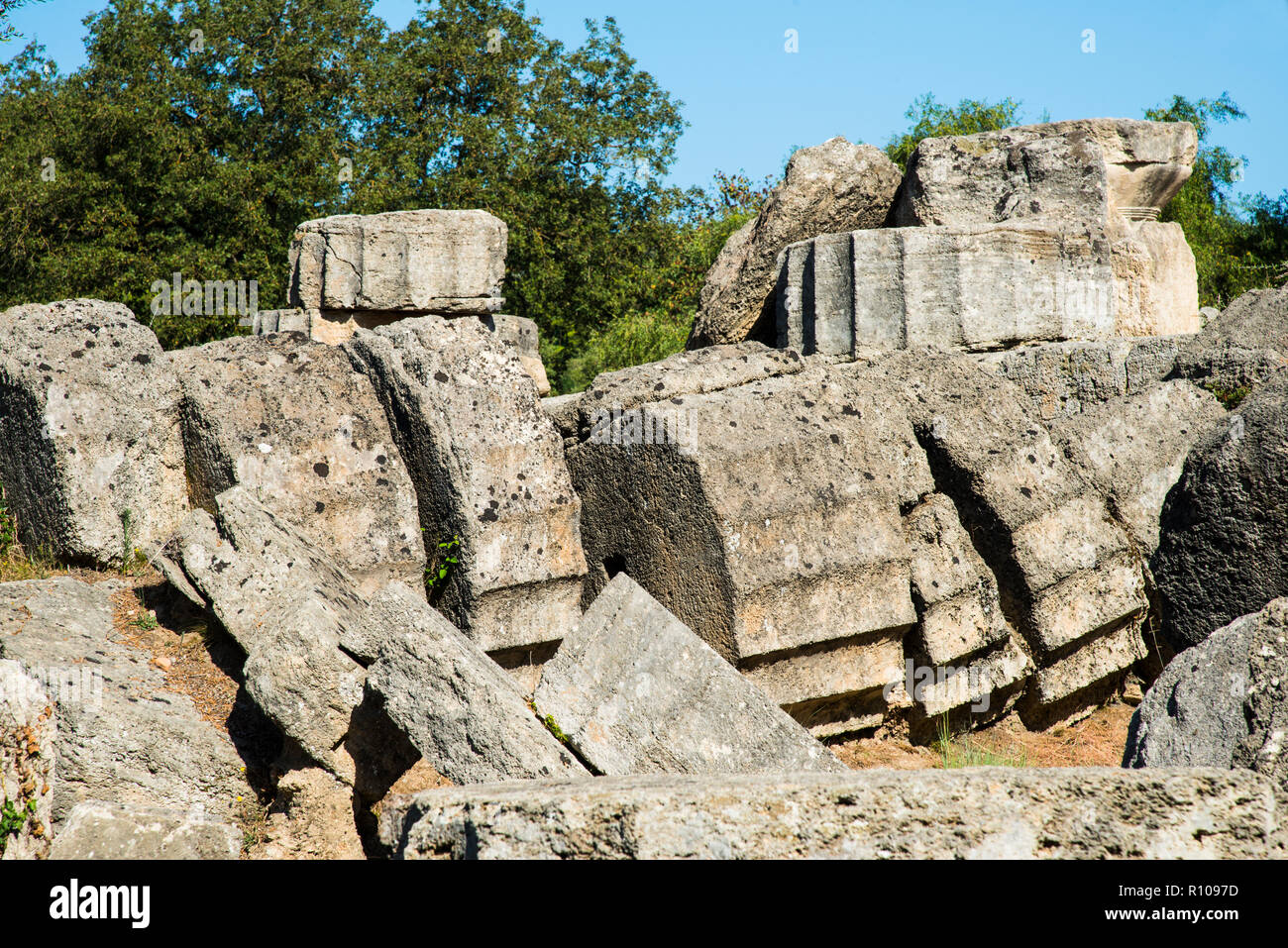 ancient column pieces that fell after an earthquake Stock Photo Alamy