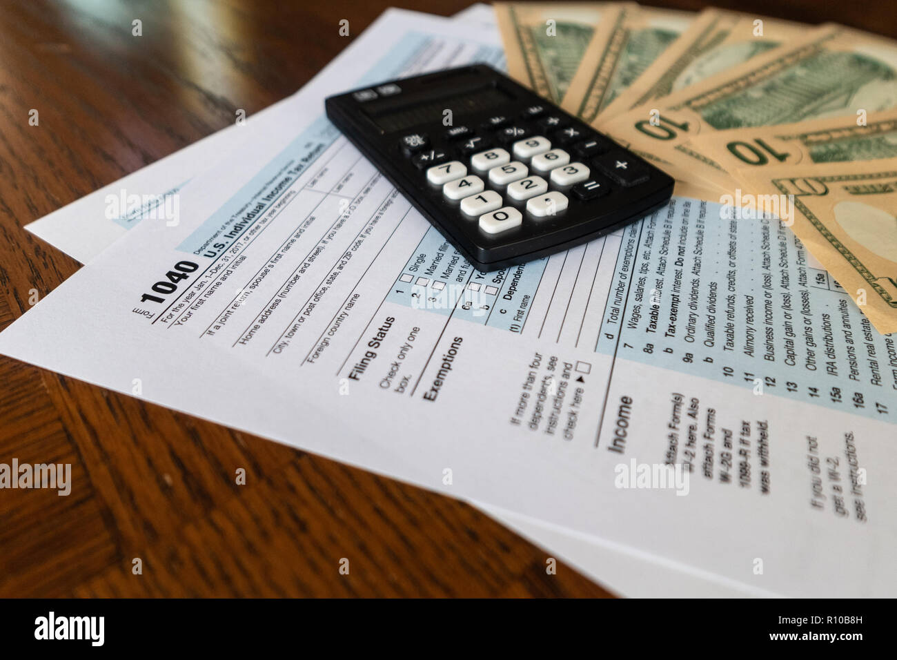 US Tax form and calculator with used to calculate tax refund Stock