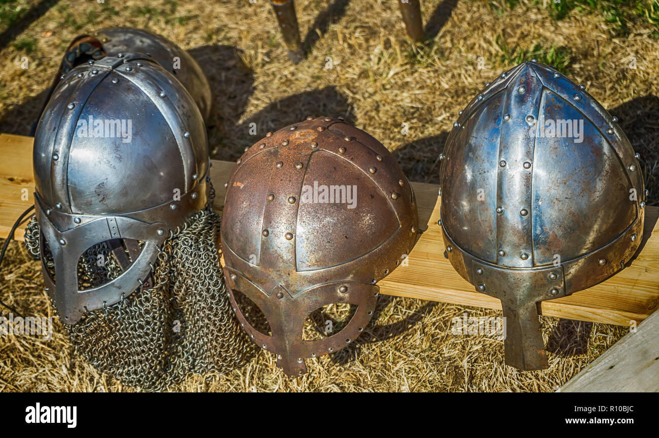 Three helmets with nose protection as worn by medieval knights in the
