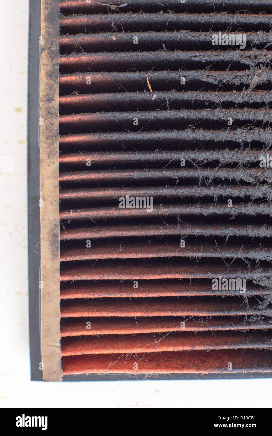 Changing an air filter . Detail, texture, Dirty, clogged air filter surface . General auto