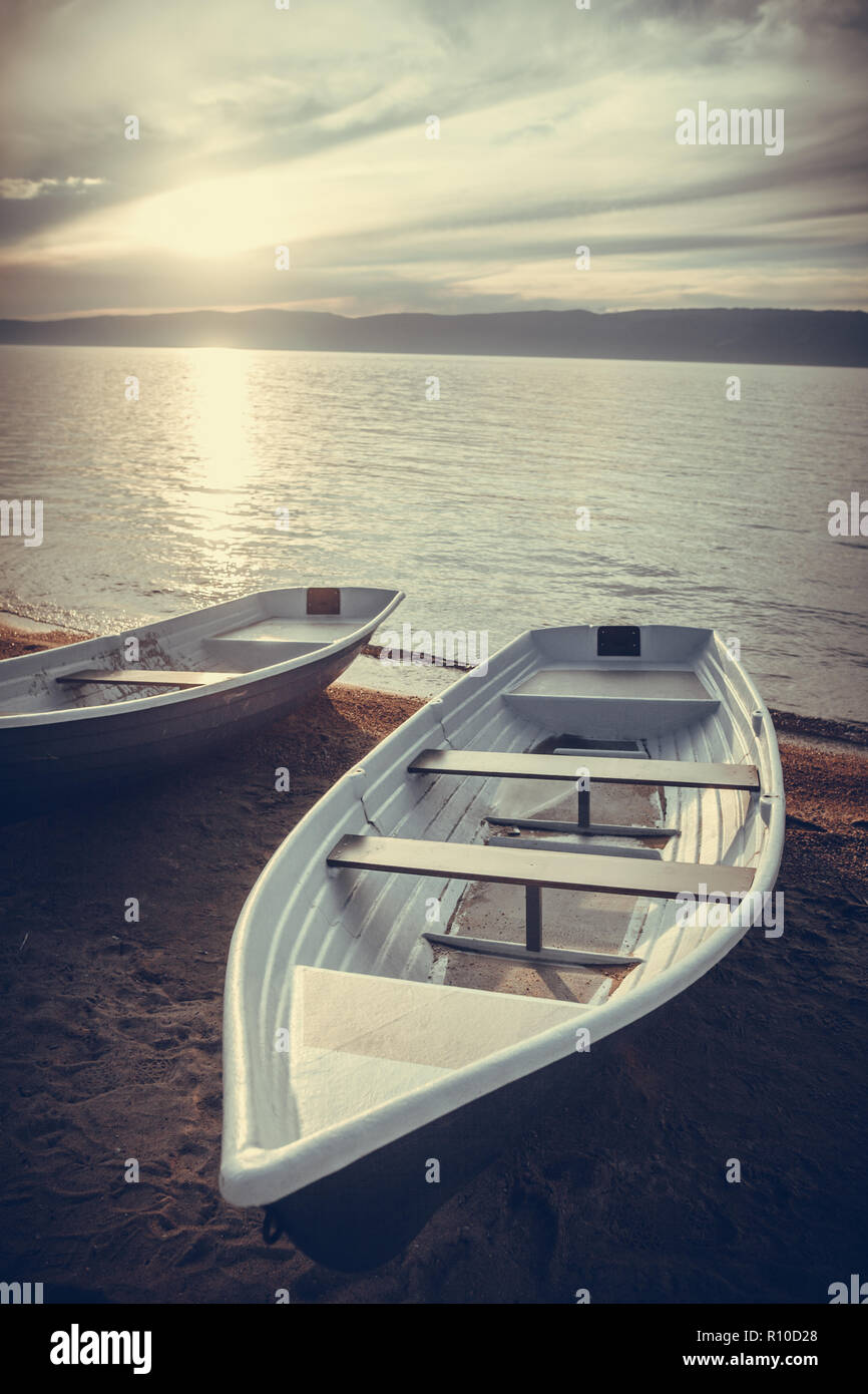 Two boats on shore water hi-res stock photography and images - Alamy