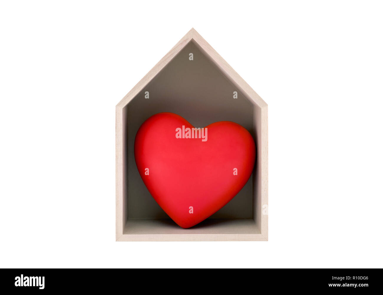 Wooden house with red heart isolated on white with clipping path Stock Photo