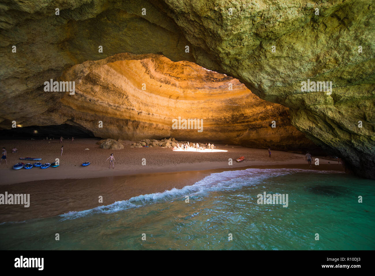 Benagil, Portugal - Juny, 2018: Benagil Cave Boat Tour inside Algar de Benagil, cave listed in the world's top 10 best caves. Algarve coast near Lagoa Stock Photo