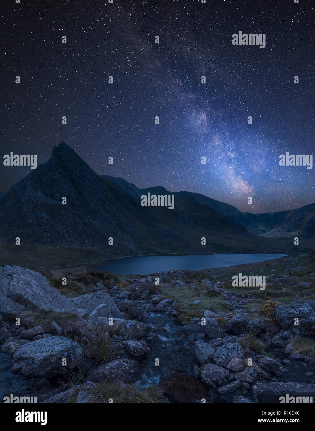 Stunning vibrant Milky Way composite image over Beautiful landscape ...