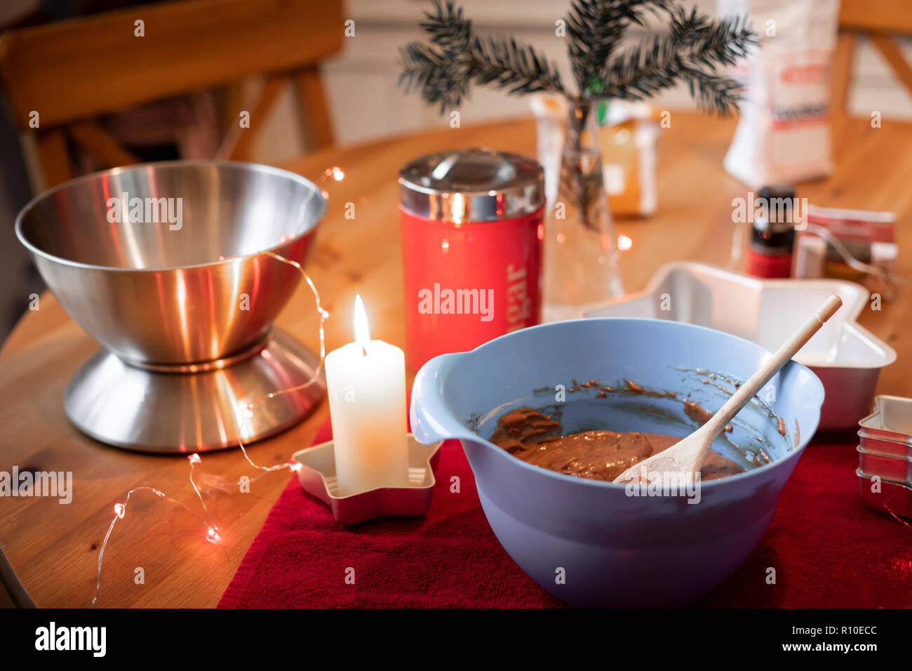 Mixing together ingredients of hot-water crust pastry dough, using wooden  spoon Stock Photo - Alamy