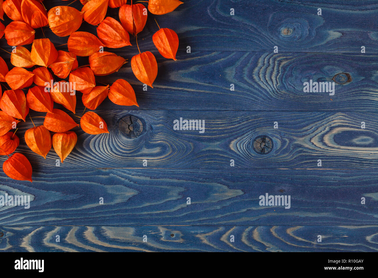 Autumn leaves on wooden boards, background of autumn Stock Photo - Alamy