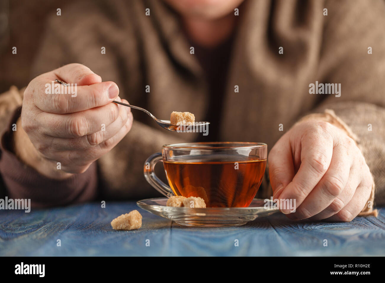 Add sugar coffee male hand hi-res stock photography and images - Alamy