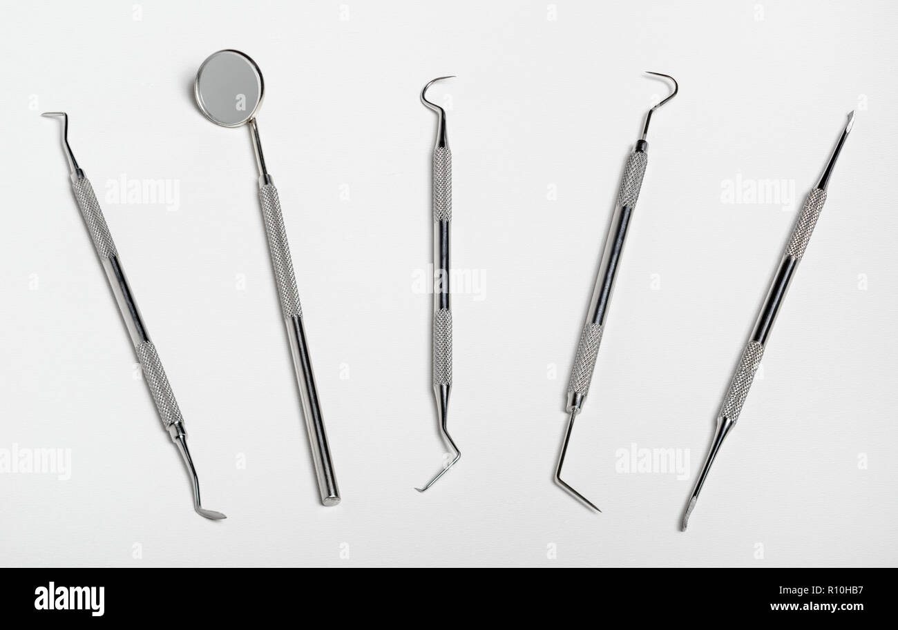 Dental dentist tooth instruments tools with stomatoscope scaler mirrow steel set Stock Photo