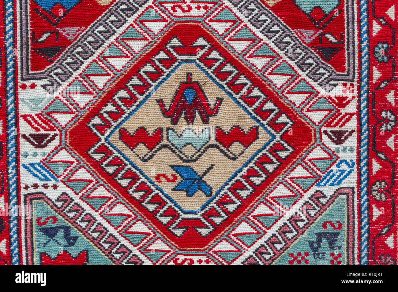 The traditional patterns on Georgian rug Stock Photo - Alamy