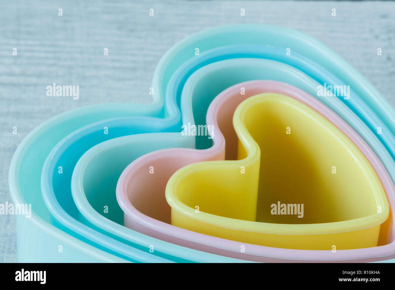 Heart shaped cookie cutter on white background Stock Photo