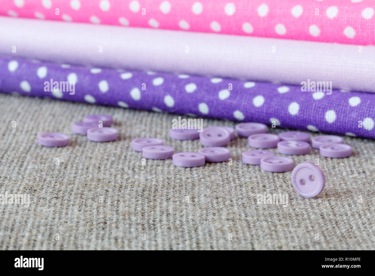heap of cloth fabrics, close up Stock Photo