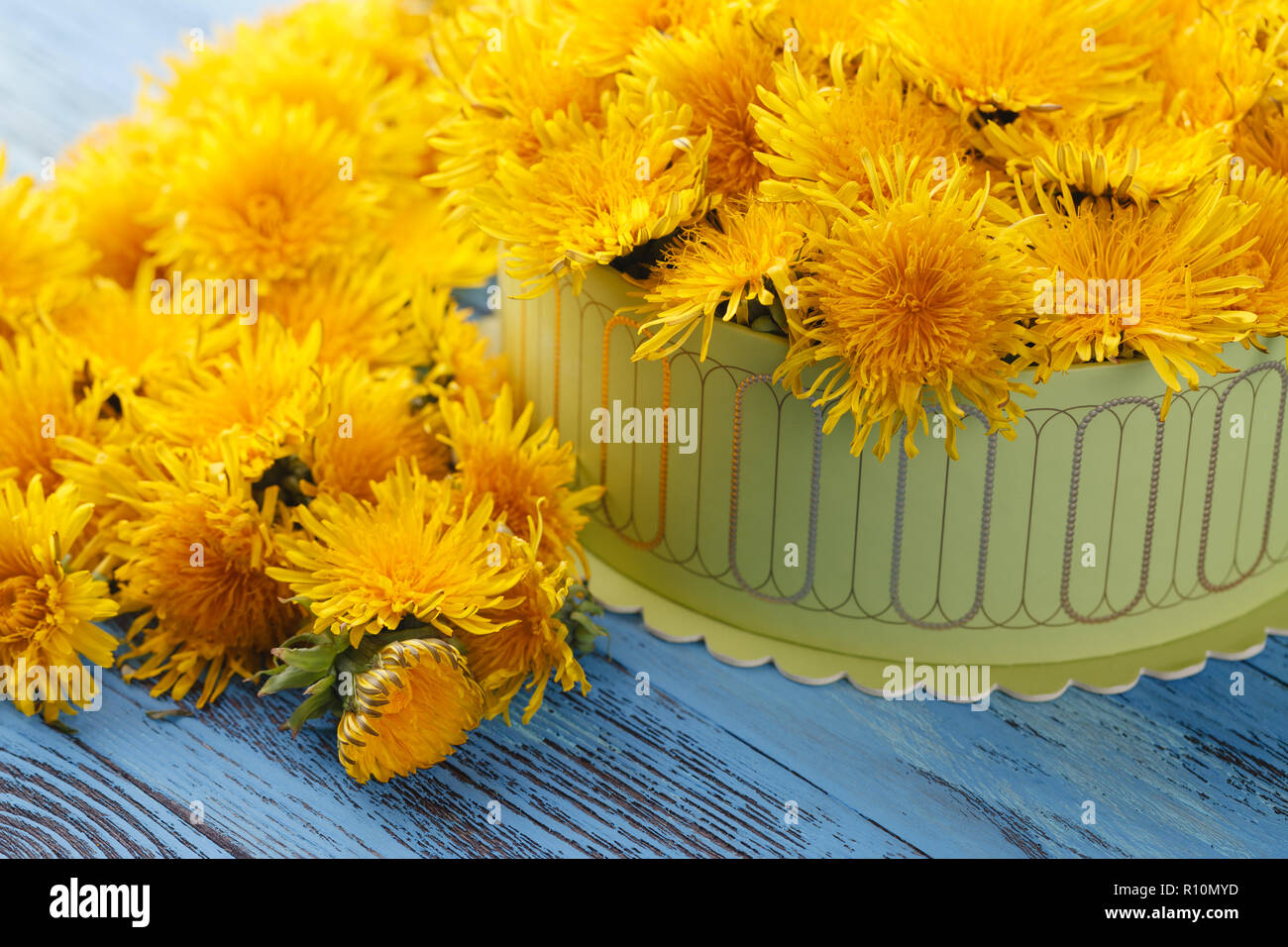 Box full of yellow flowers Stock Photo - Alamy