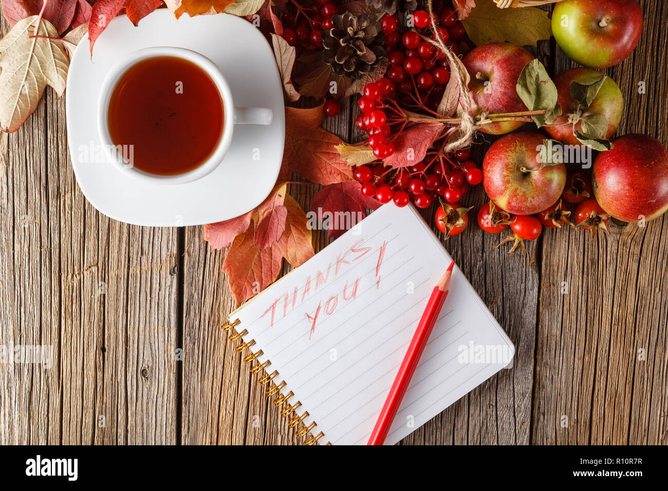 Fall wealth with message thank you in note on rustic wooden background ...