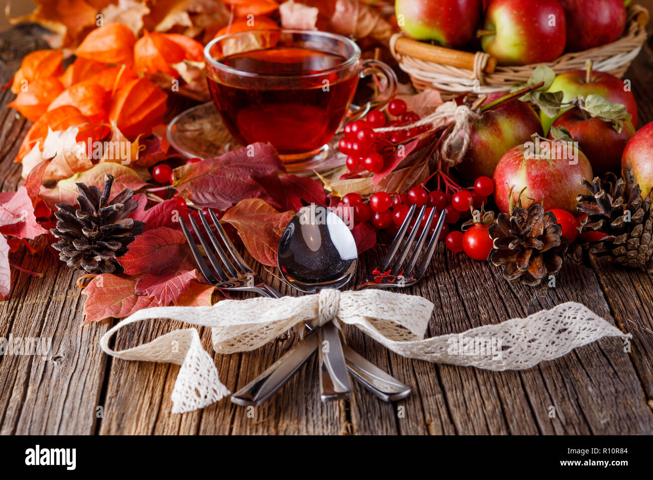 Fall wealth on rustic wooden background with fork and spoon Stock Photo ...