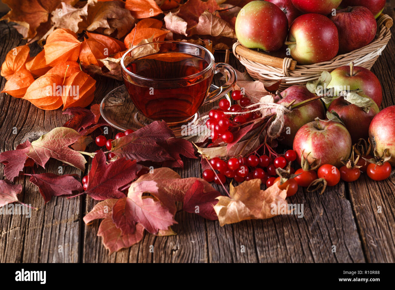 Fall wealth on rustic wooden background with notes Stock Photo - Alamy