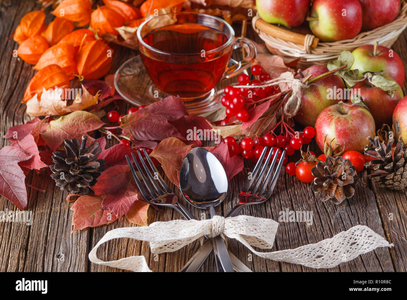 Fall wealth on rustic wooden background with fork and spoon Stock Photo ...