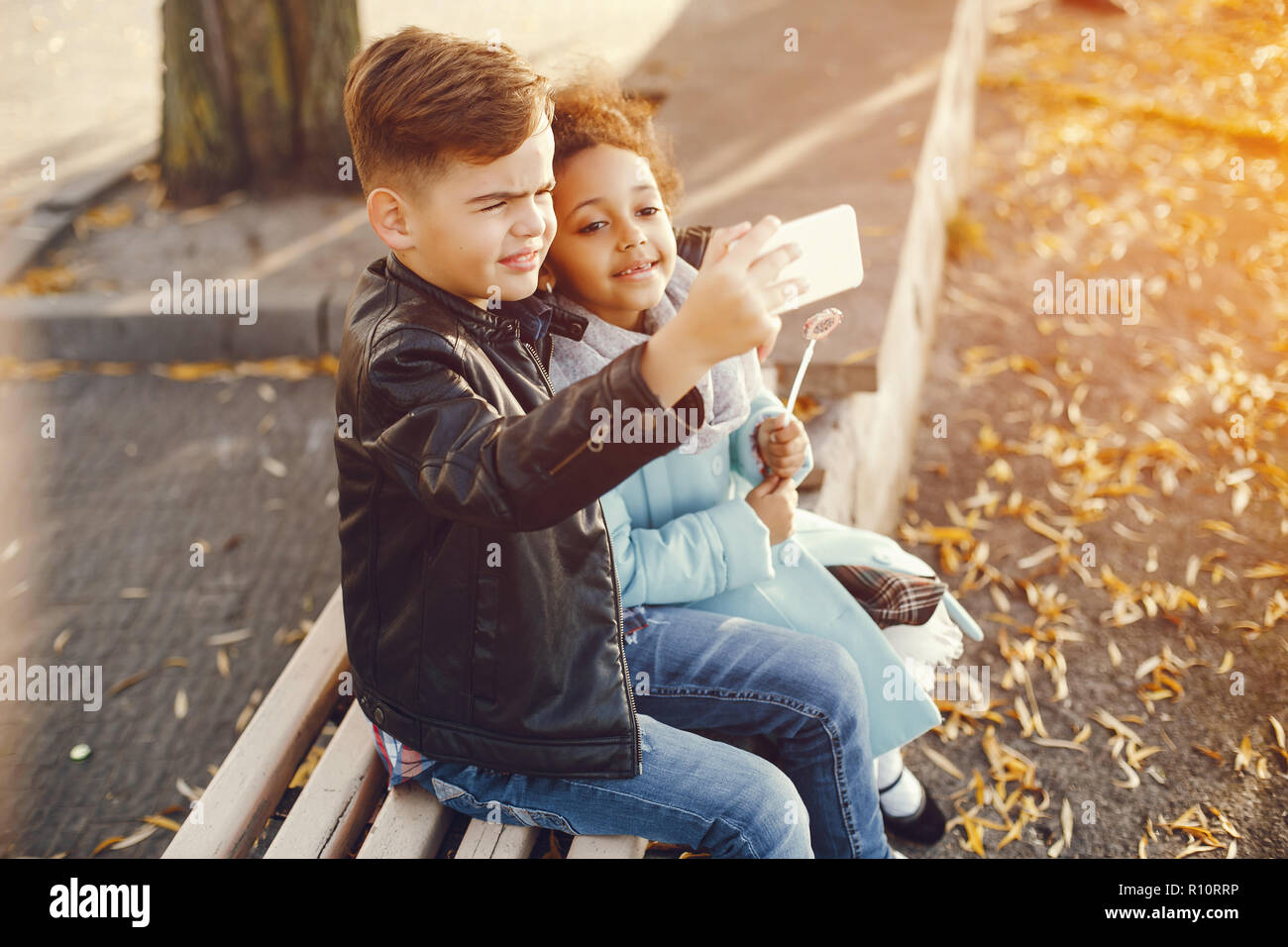 children in a park Stock Photo - Alamy