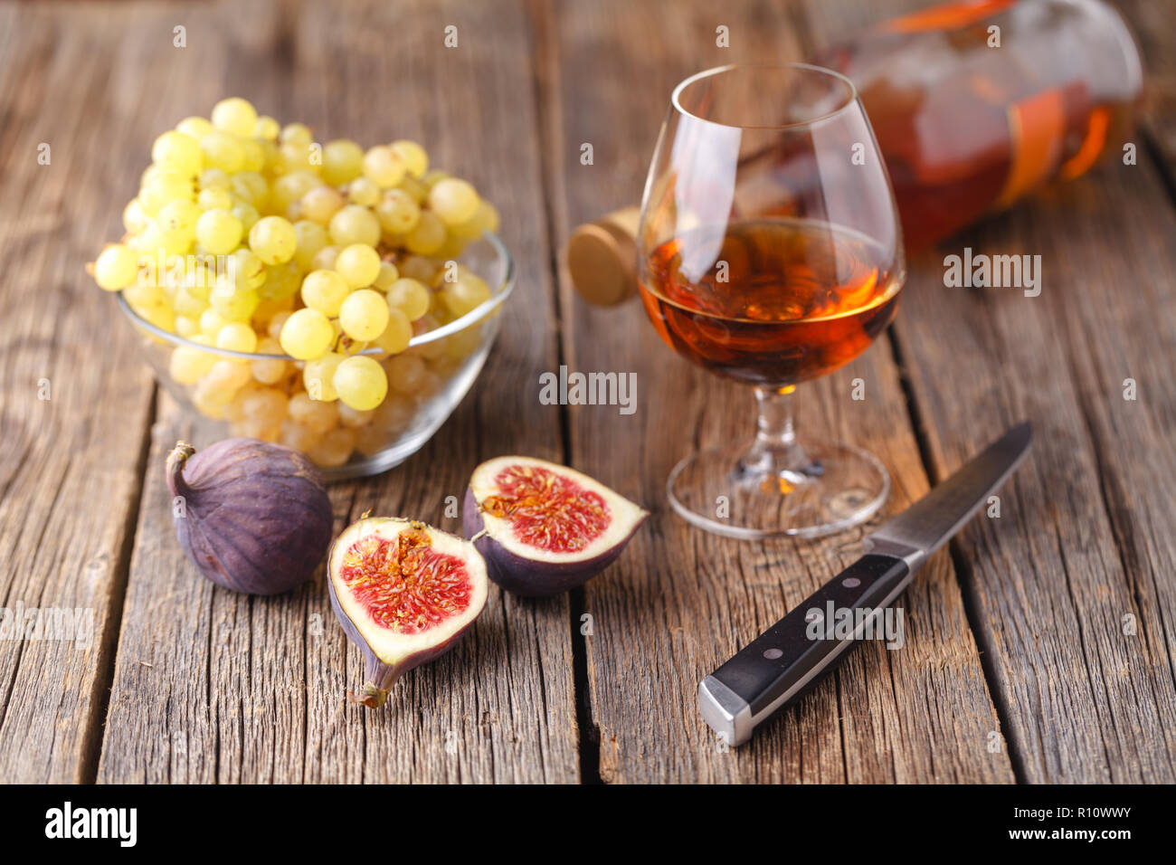 alcohol and a snack from fruit Stock Photo Alamy