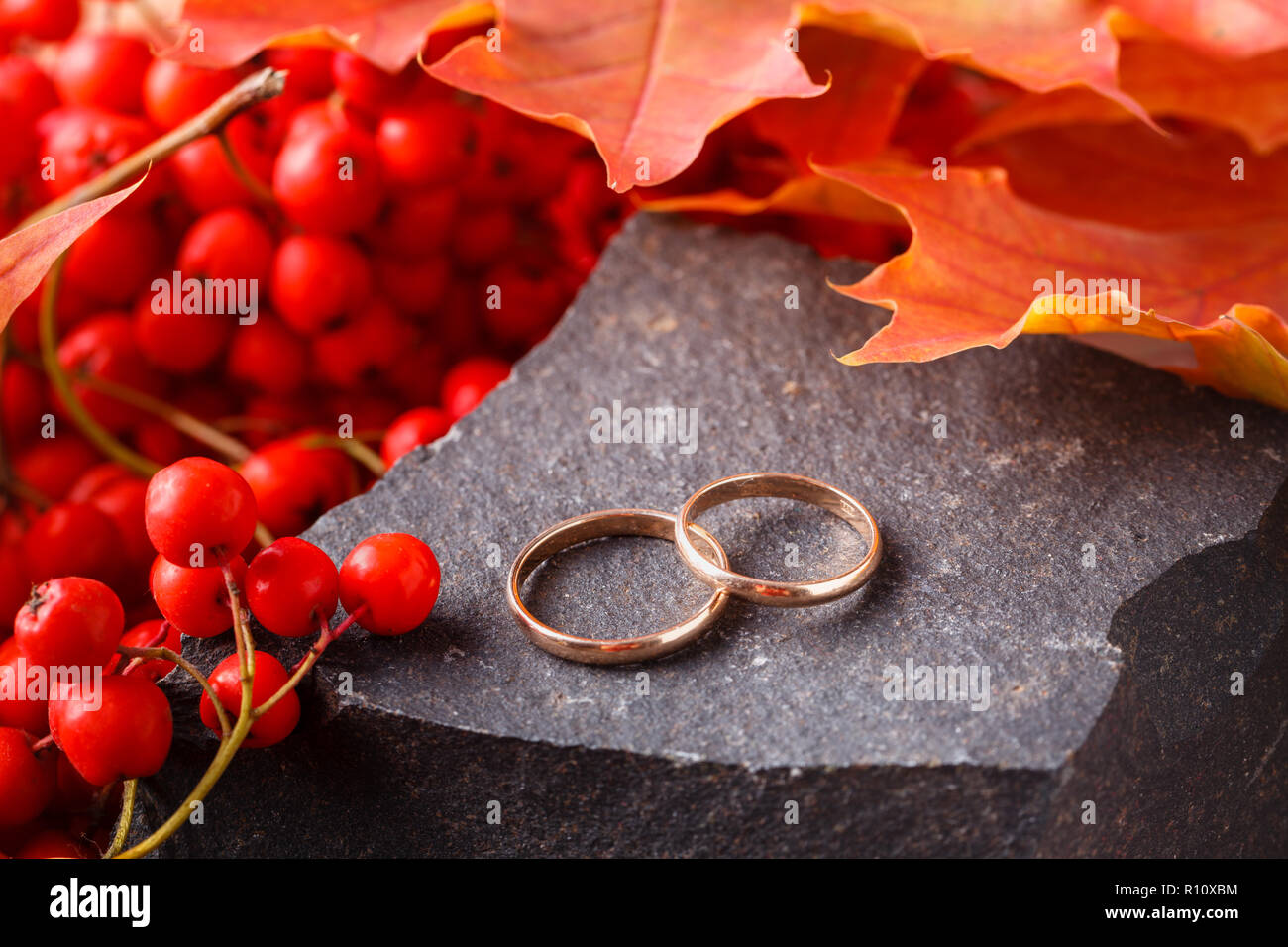 Wedding Decoration Red Leaves On Weathered Stone With Wedding